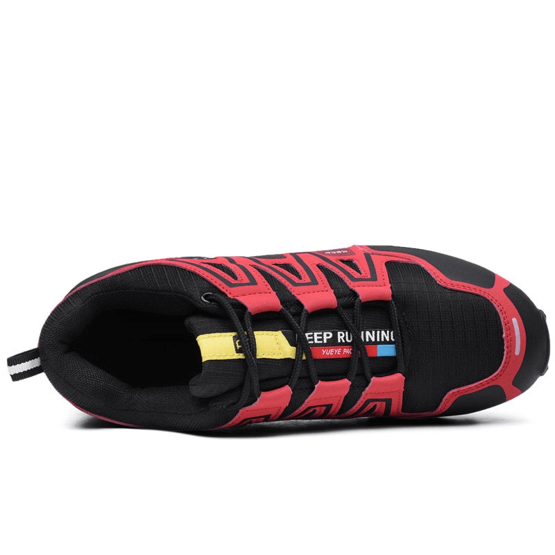 Top view of waterproof non-slip men's sneakers in red and black with breathable mesh lining, perfect for sports activities.